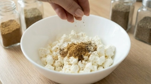 Étape 5: Incorporez le cumin moulu et le poivre noir au mé...