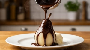 Étape 12: Nappez généreusement la poire de sauce au chocol...