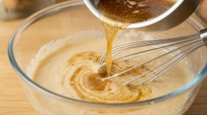 Étape 5: Incorporez enfin le beurre noisette tiédi à votr...